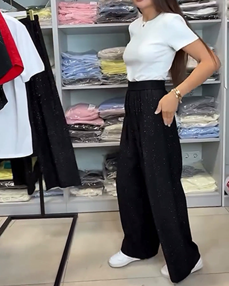 Elegantní lesklé široké kalhoty s vysokým pasem