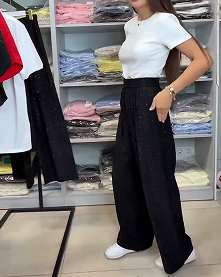 Elegantní lesklé široké kalhoty s vysokým pasem